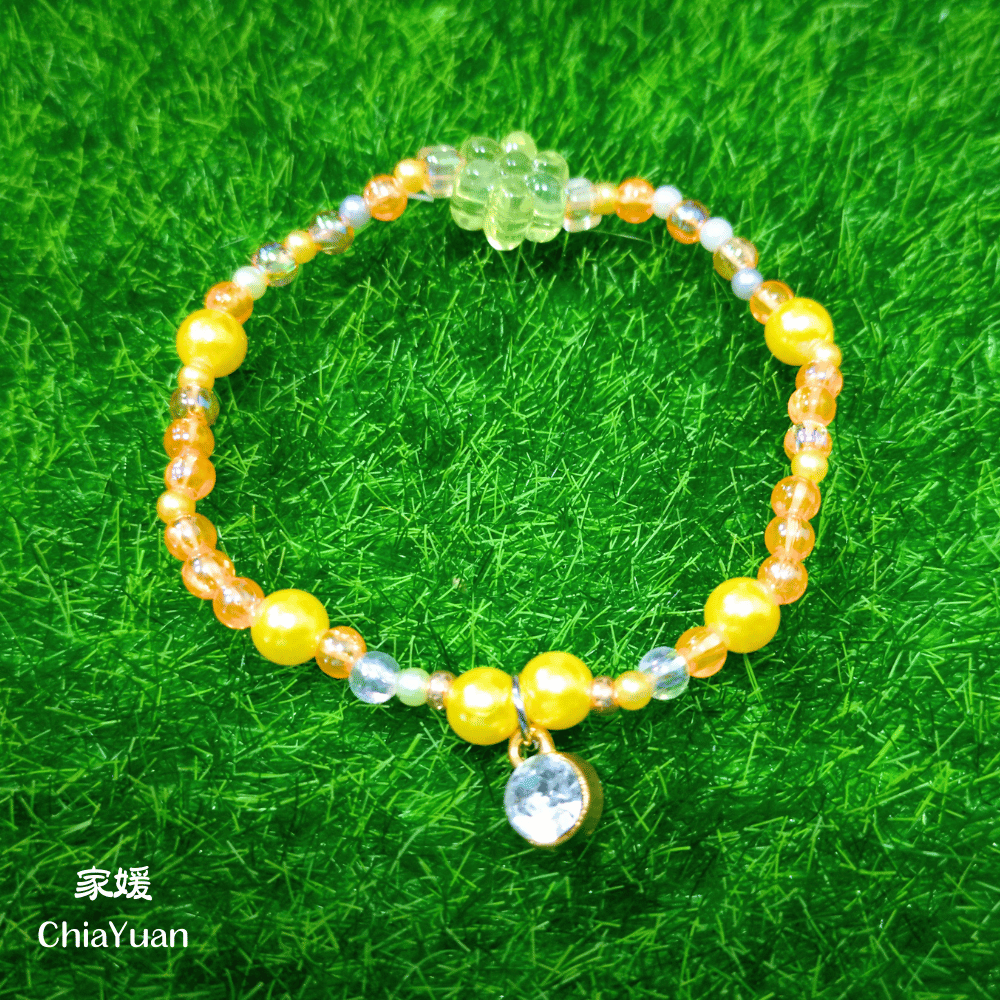 ♥︎ChiaYuan♥︎暖色串珠手鍊｜橘黃花朵彈力手環